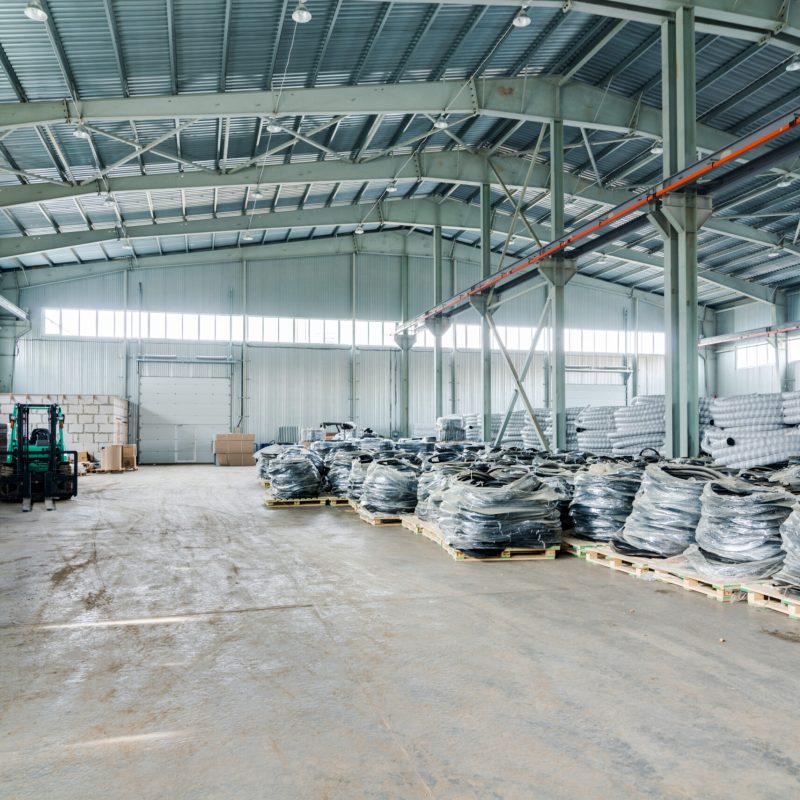 Interior of new large and modern warehouse space with nobody around